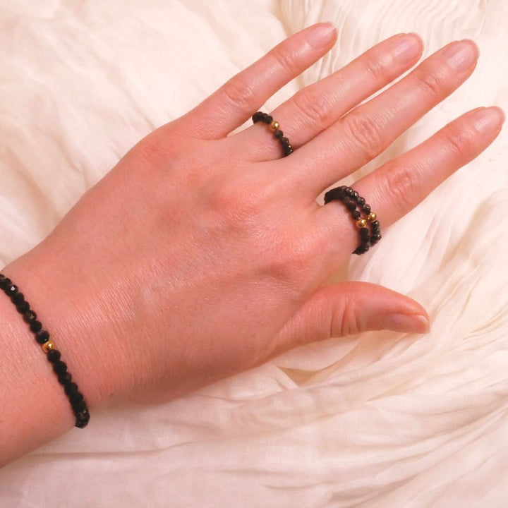 Obsidian Ring mit vergoldeter Perle